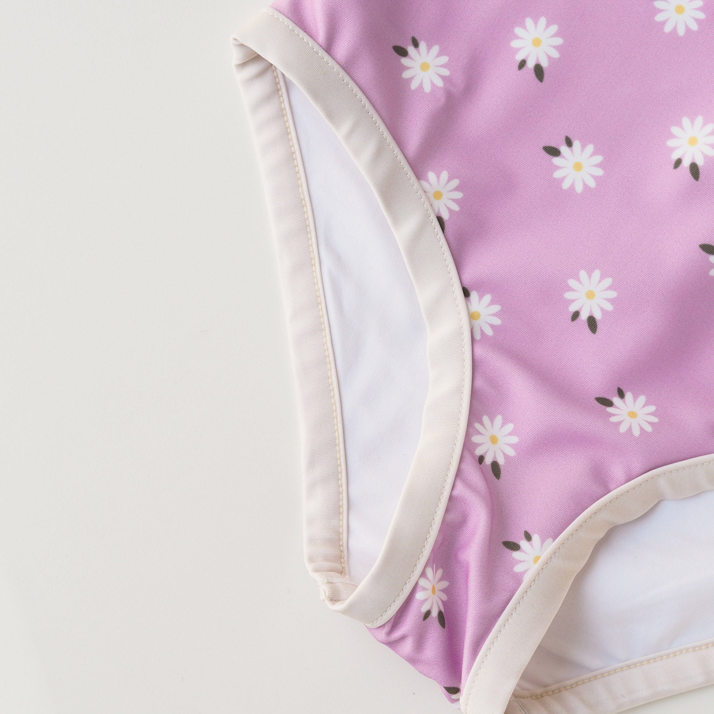 Meisje UV Badpak Ruffle Florence - lila met madeliefjes