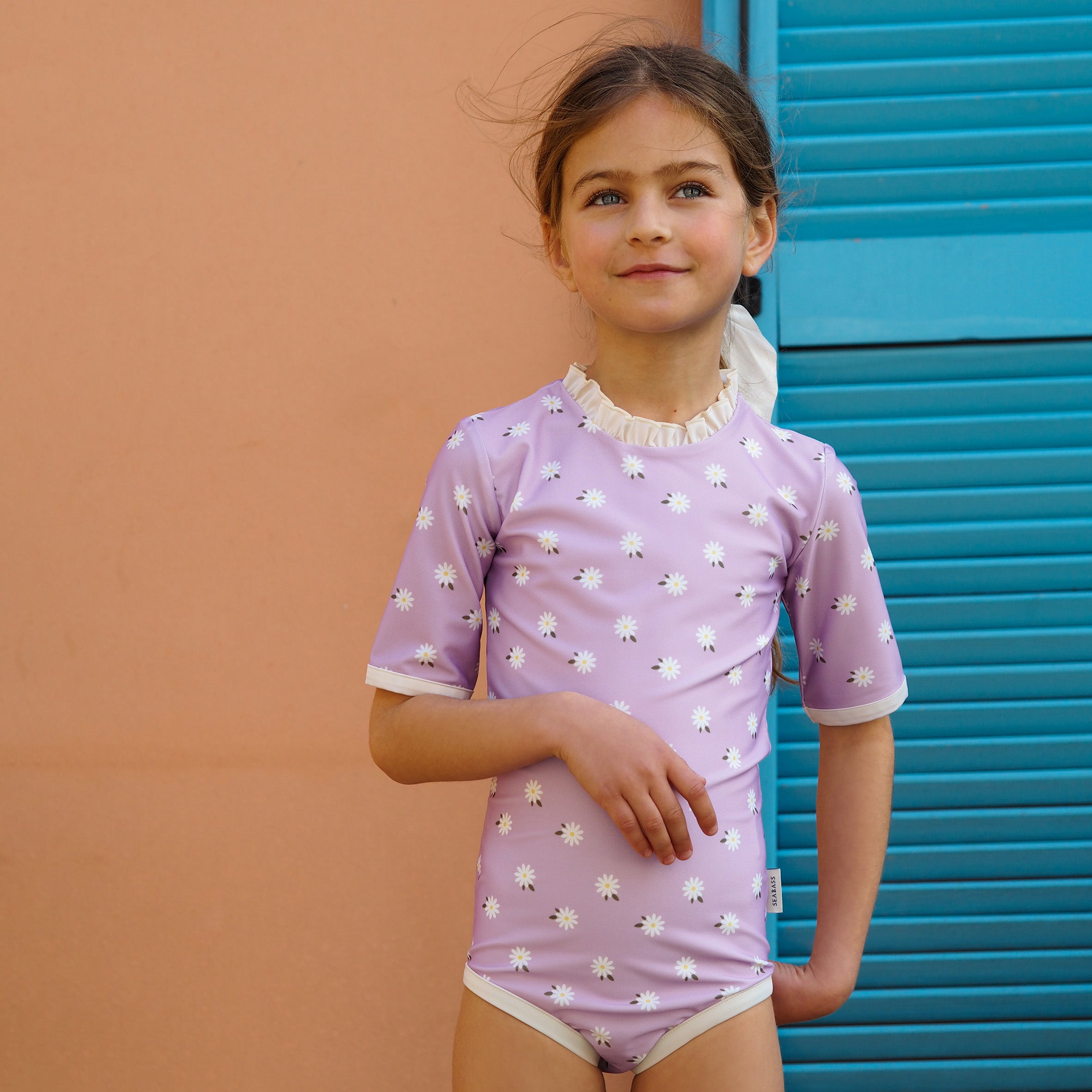 Meisje UV Badpak Ruffle Florence - lila met madeliefjes